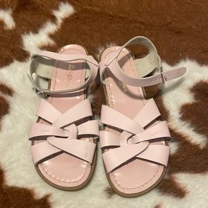 Saltwater pink sandals.